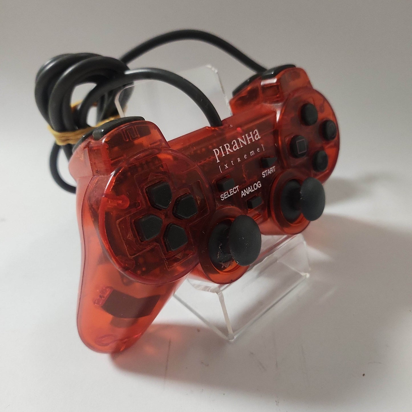 Piranha Xtreme Transparant Red Controller PS1 - Feniks Gameshop