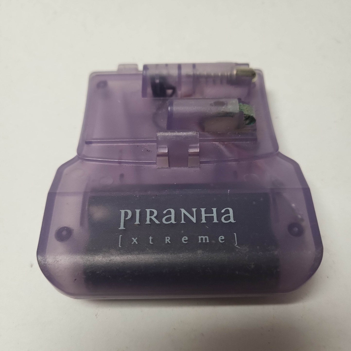 Piranha Xtreme Transparant Paars Battery Pack GB - Feniks Gameshop