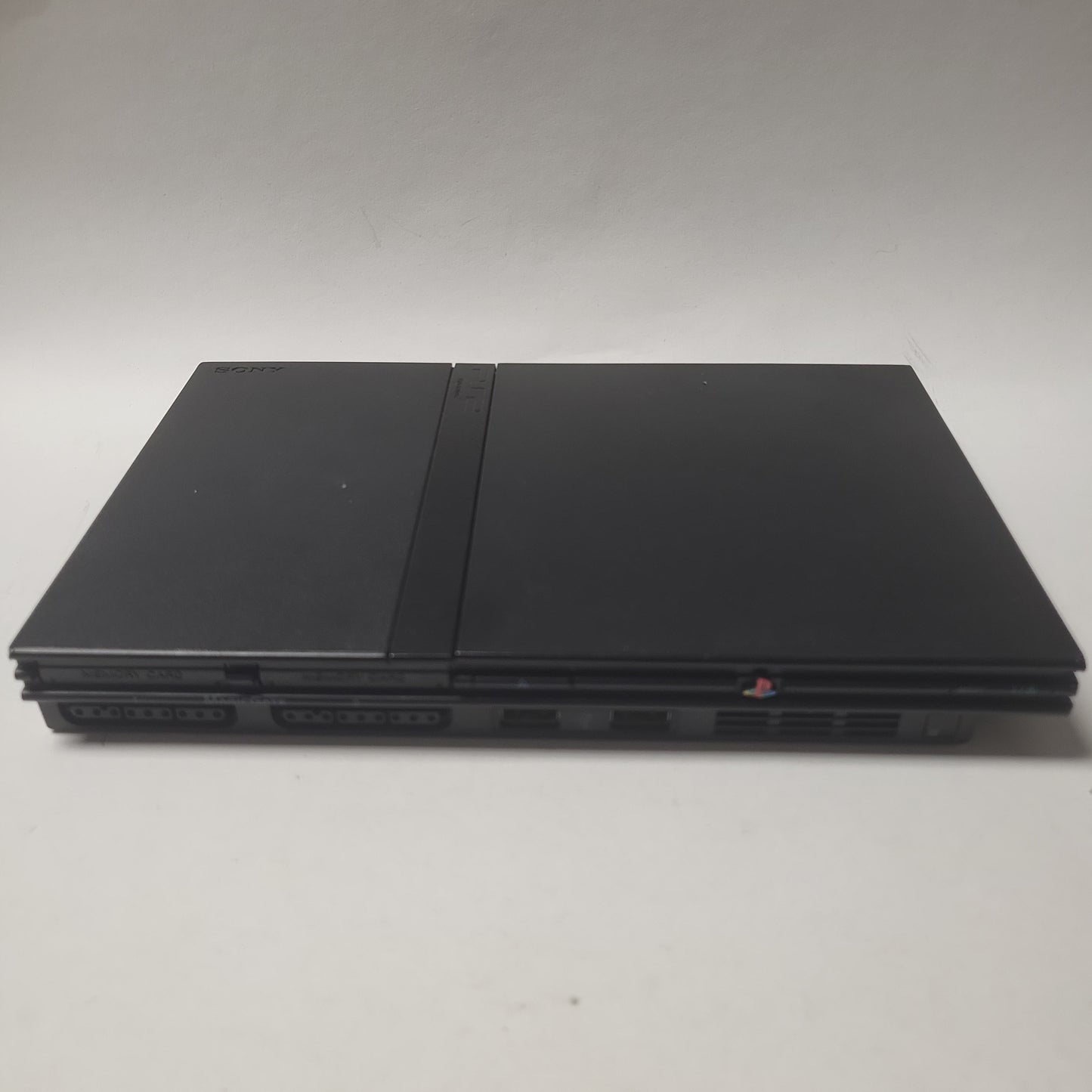 Playstation 2 Slim (SCPH-75004) + Adapter