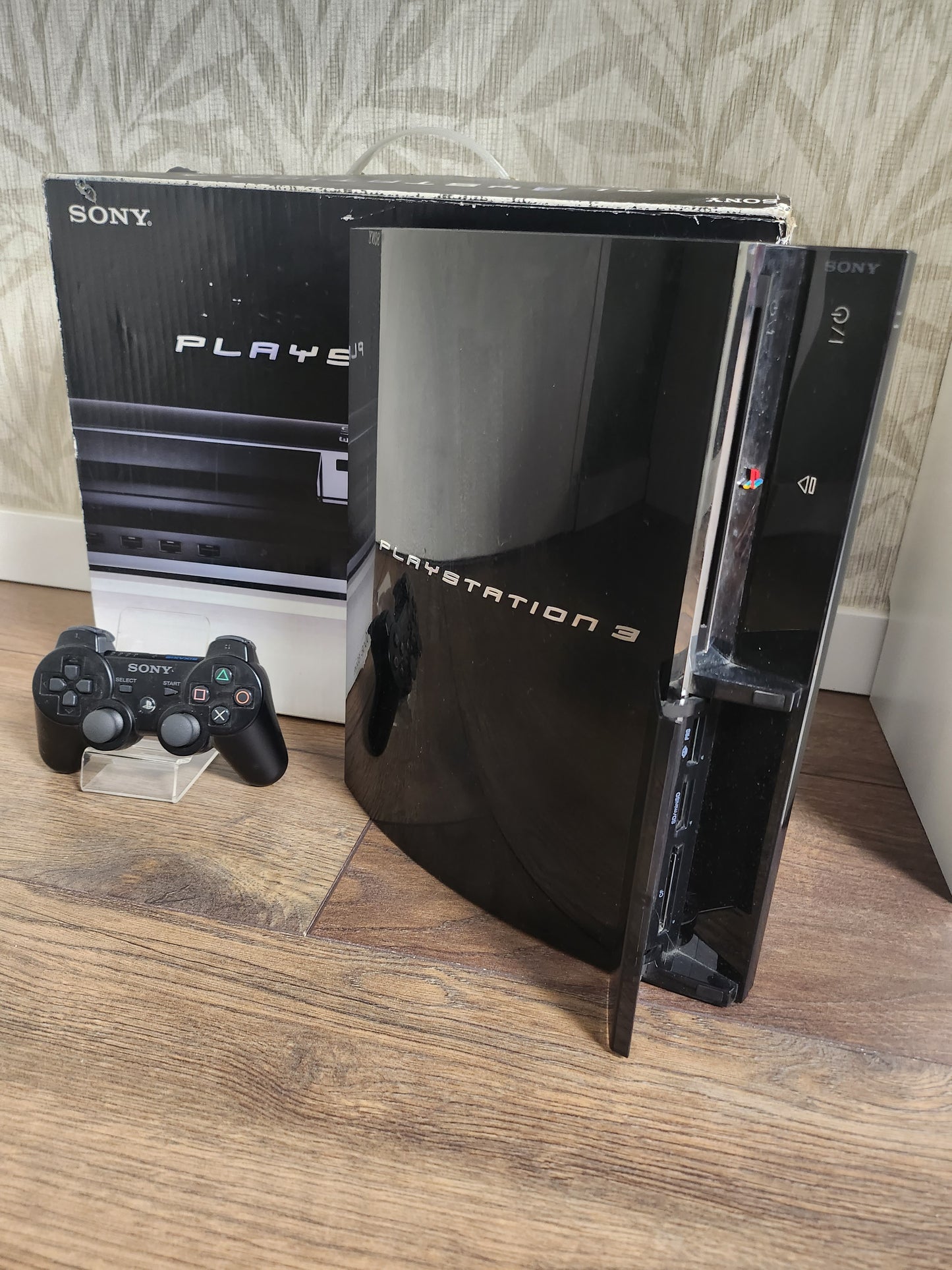 Playstation 3 60gb Backwards Compatible in doos, controller, kabels, boekjes, inlay