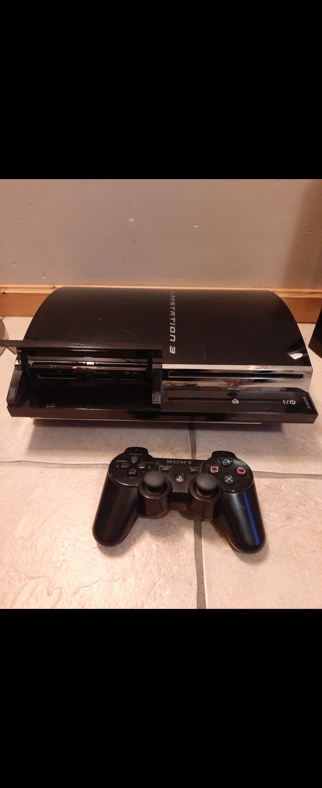 Playstation 3 60gb Backwards Compatible in doos, controller, kabels, boekjes, inlay