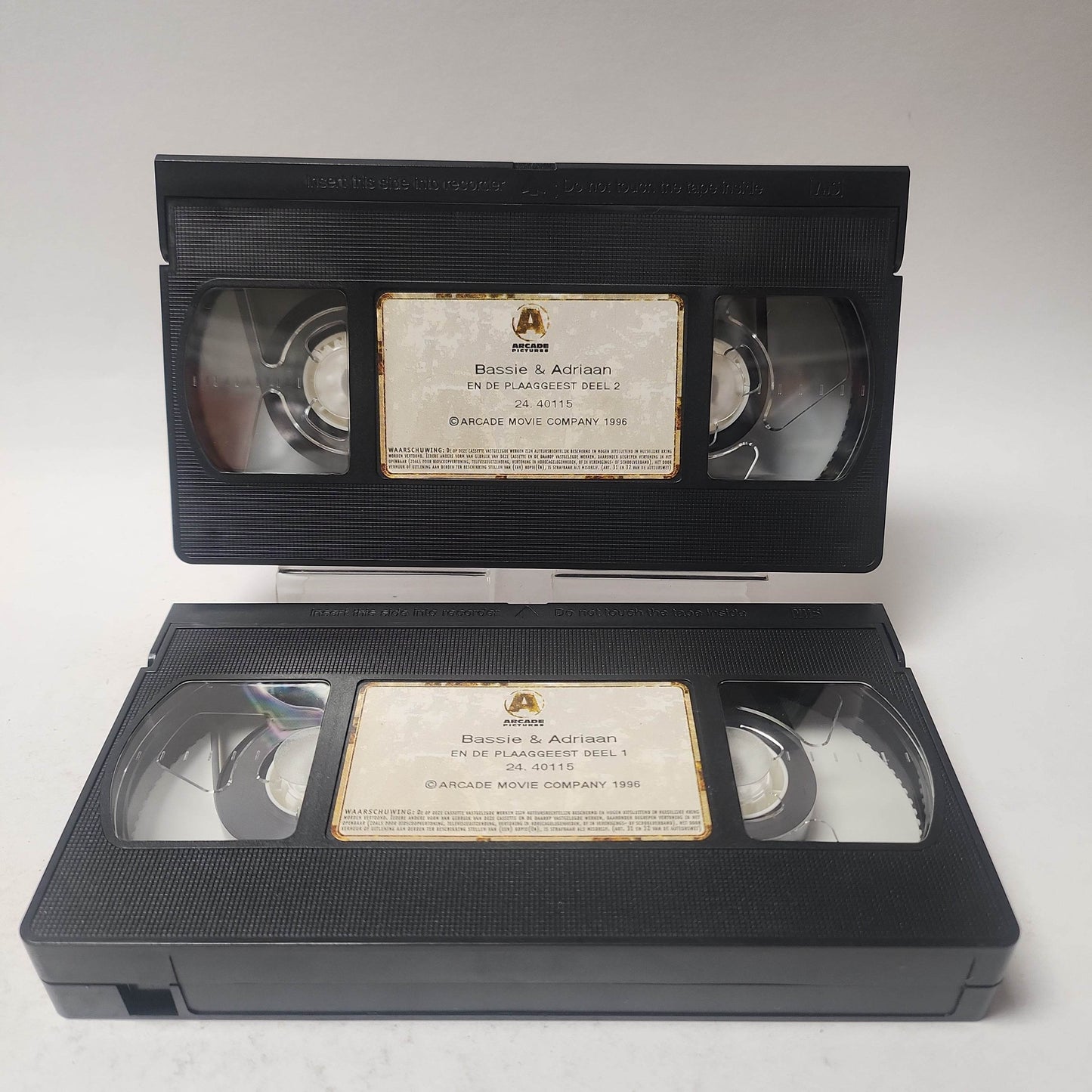 Bassie & Adriaan en de Plaaggeest Deel 1 & 2 VHS - Feniks Gameshop