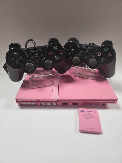 Roze Playstation 2, 2 controllers, roze memorycard en alle kabels - Feniks Gameshop
