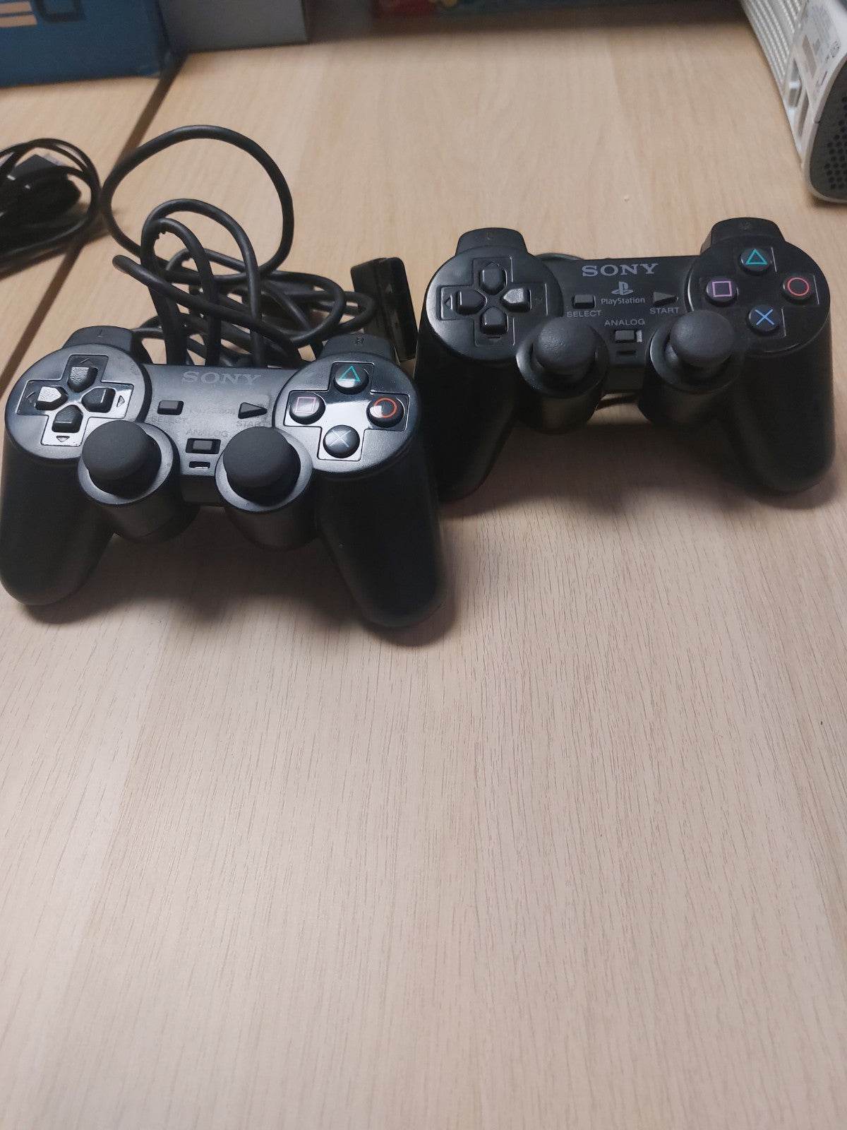 Playstation 2 Slim in doos inclusief memorycard, 2 controllers, ac adaptor , boekjes en AV-kabel - Feniks Gameshop