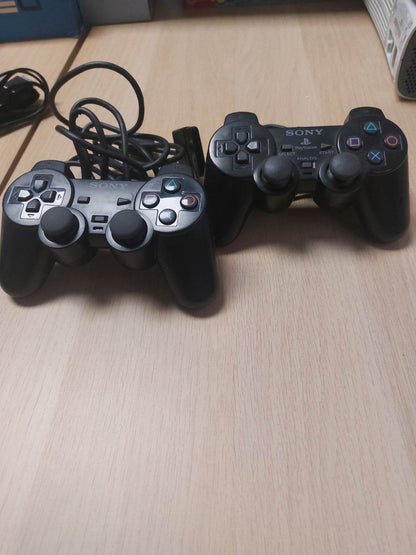 Playstation 2 Slim in doos inclusief memorycard, 2 controllers, ac adaptor , boekjes en AV-kabel - Feniks Gameshop