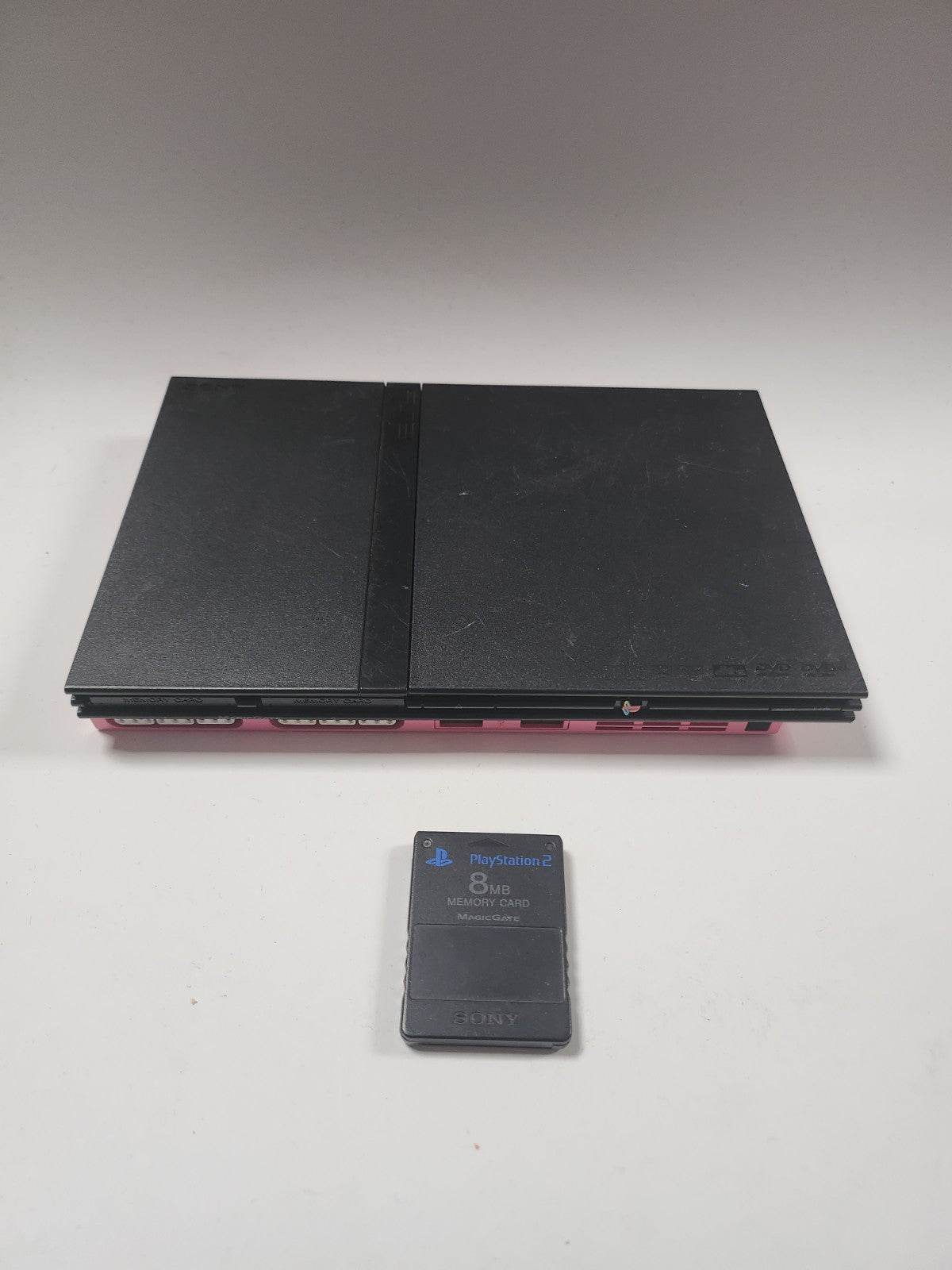 Roze zwarte Playstation 2 Slim, 2 controllers, memorycard en alle kabels - Feniks Gameshop
