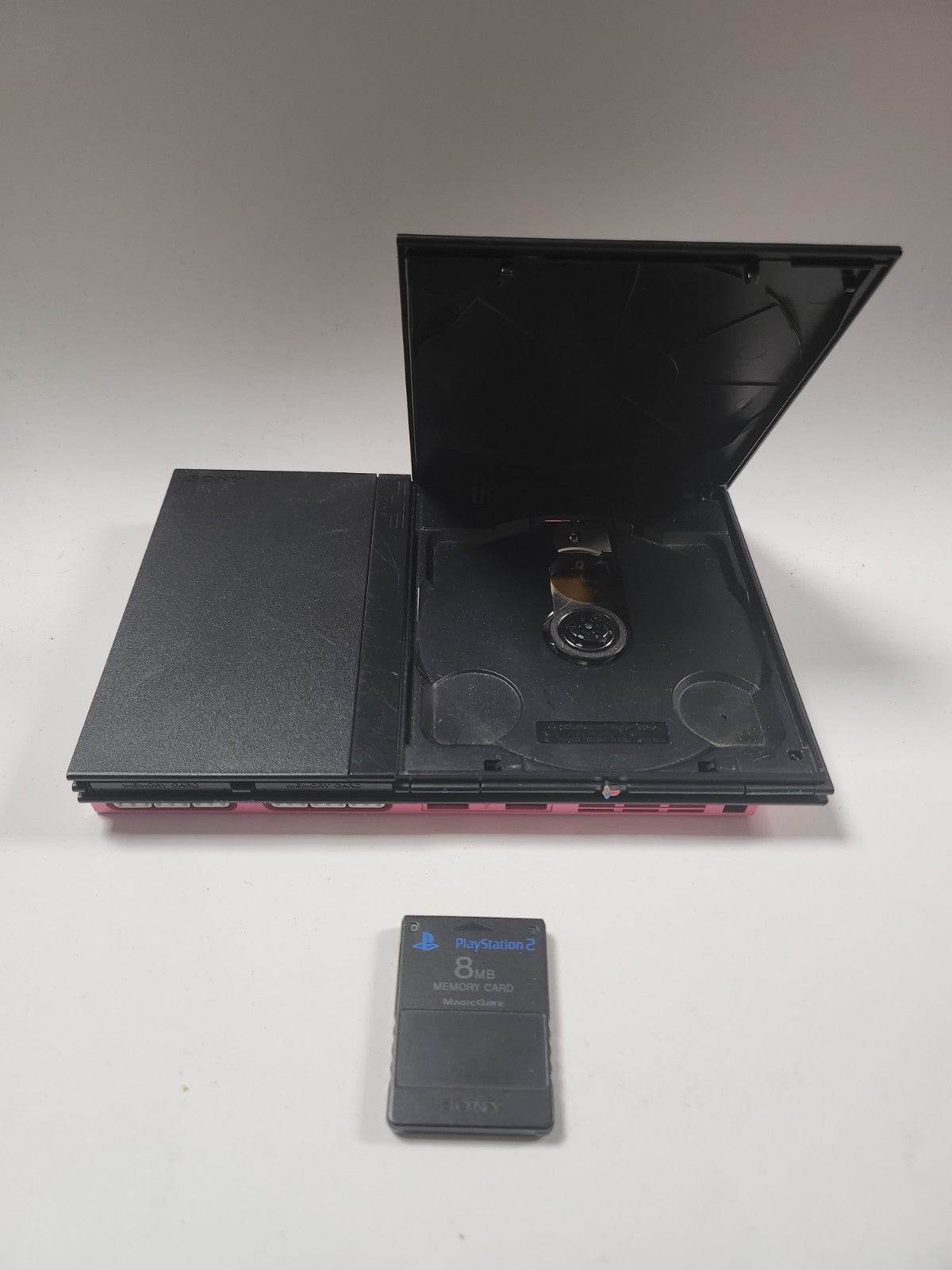 Roze zwarte Playstation 2 Slim, 2 controllers, memorycard en alle kabels - Feniks Gameshop