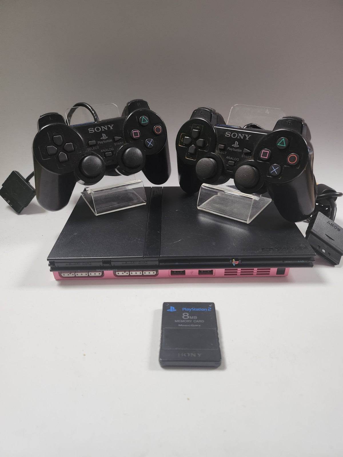 Roze zwarte Playstation 2 Slim, 2 controllers, memorycard en alle kabels - Feniks Gameshop