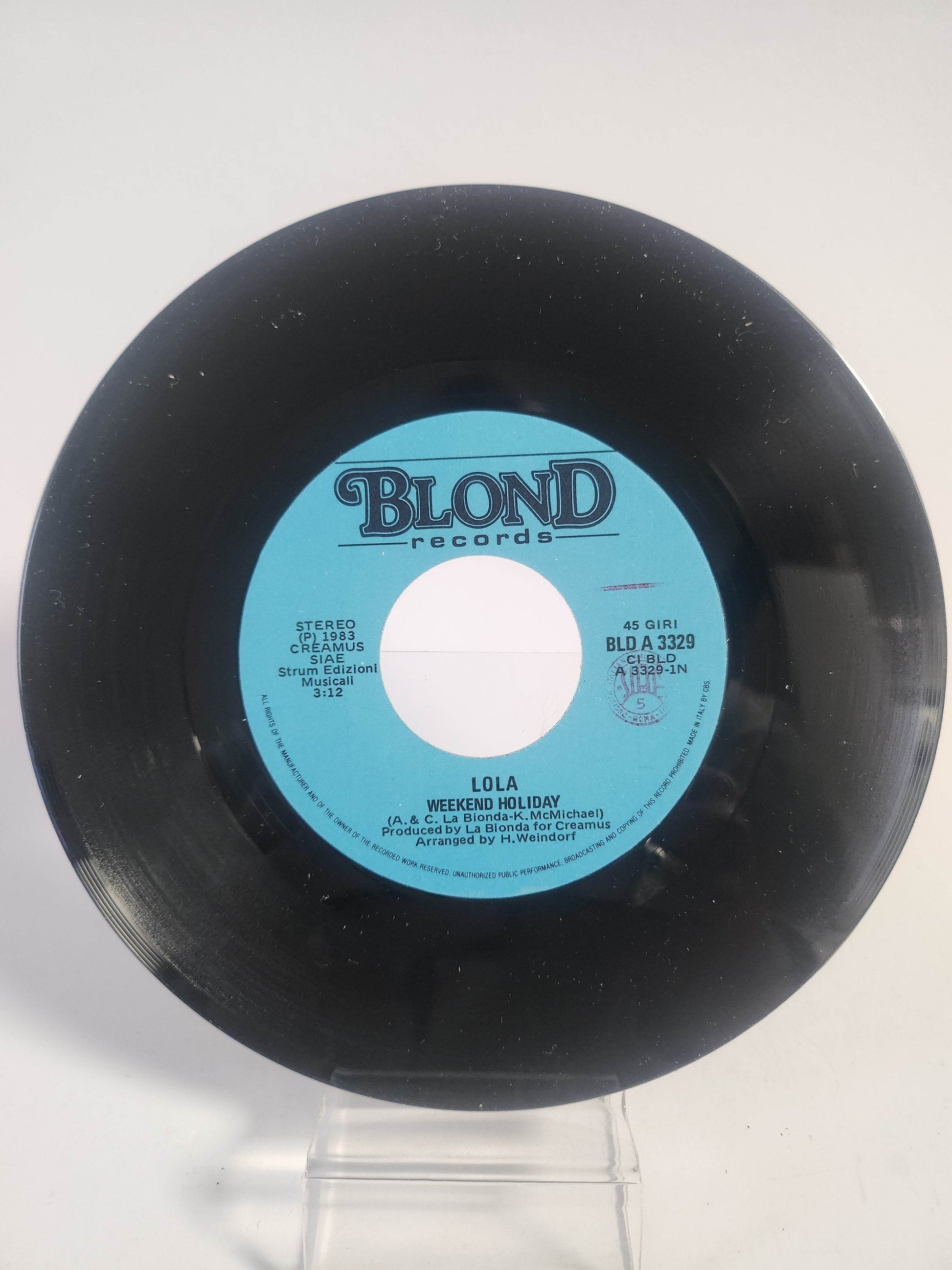 Lola: Weekend Holiday Single Vinyl - Feniks Gameshop