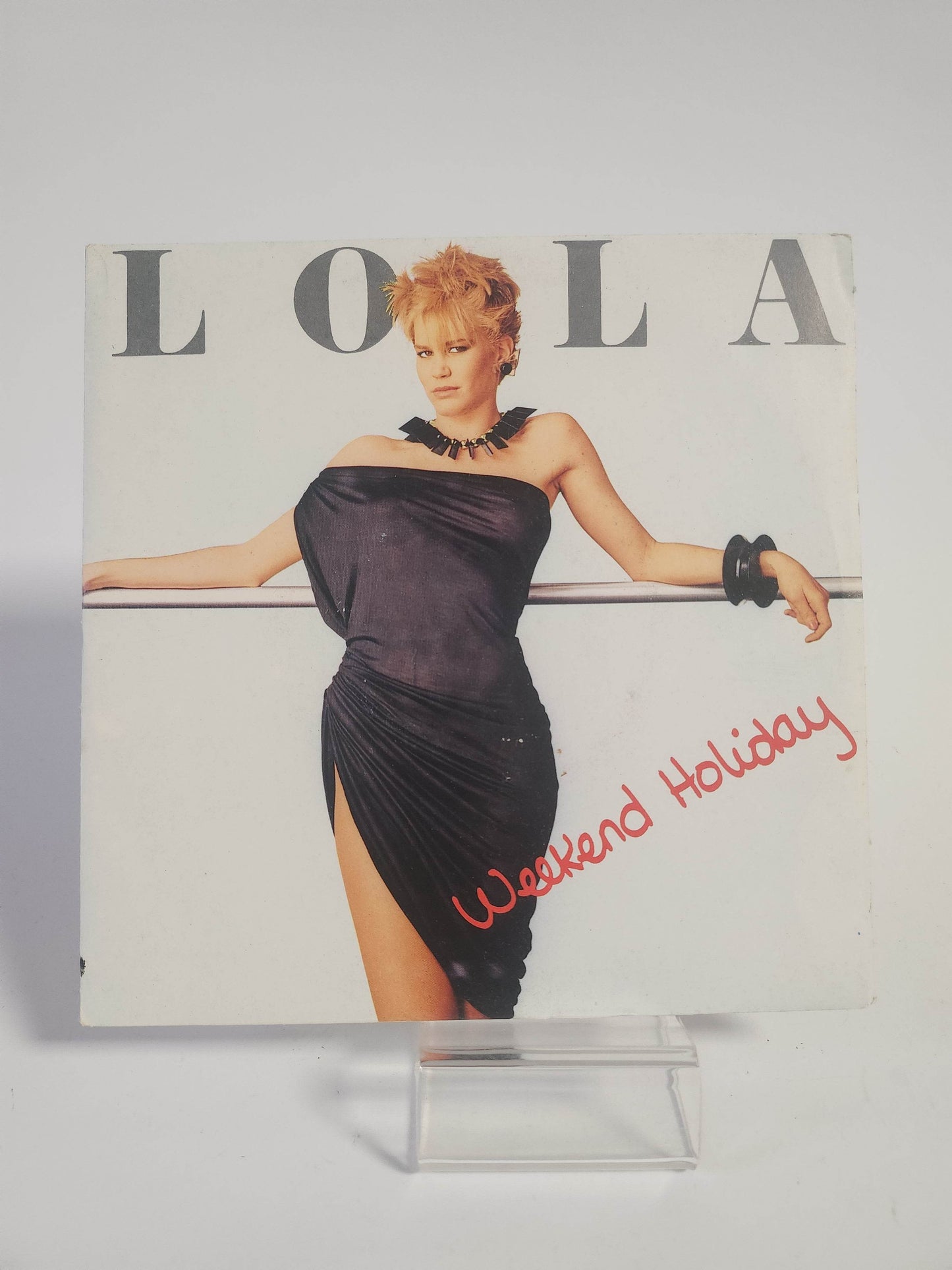 Lola: Weekend Holiday Single Vinyl - Feniks Gameshop
